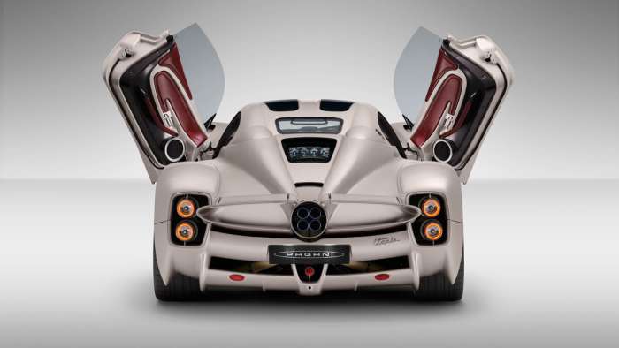 Rear view of the Pagani Utopia with its doors open. Its gauges are seen through its rear window.