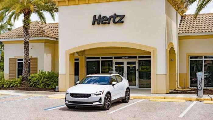 Image showing a Polestar 2 parked outside a Hertz rentals building