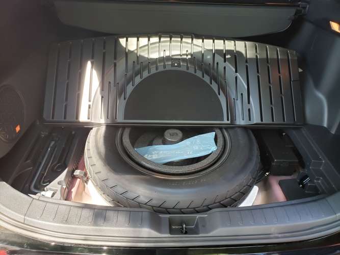 Spare tire in Toyota RAV4 Prime image by John Goreham