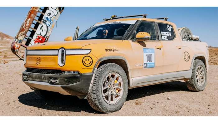Image showing a yellow Rivian R1T taking part in the Rebelle Rally