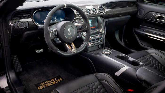 Image showing the GT500-H interior with black surfaces and gold badging.