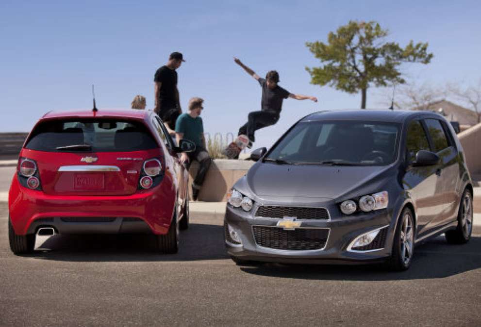 A pair of 2013 Chevy Sonic RS hatchbacks