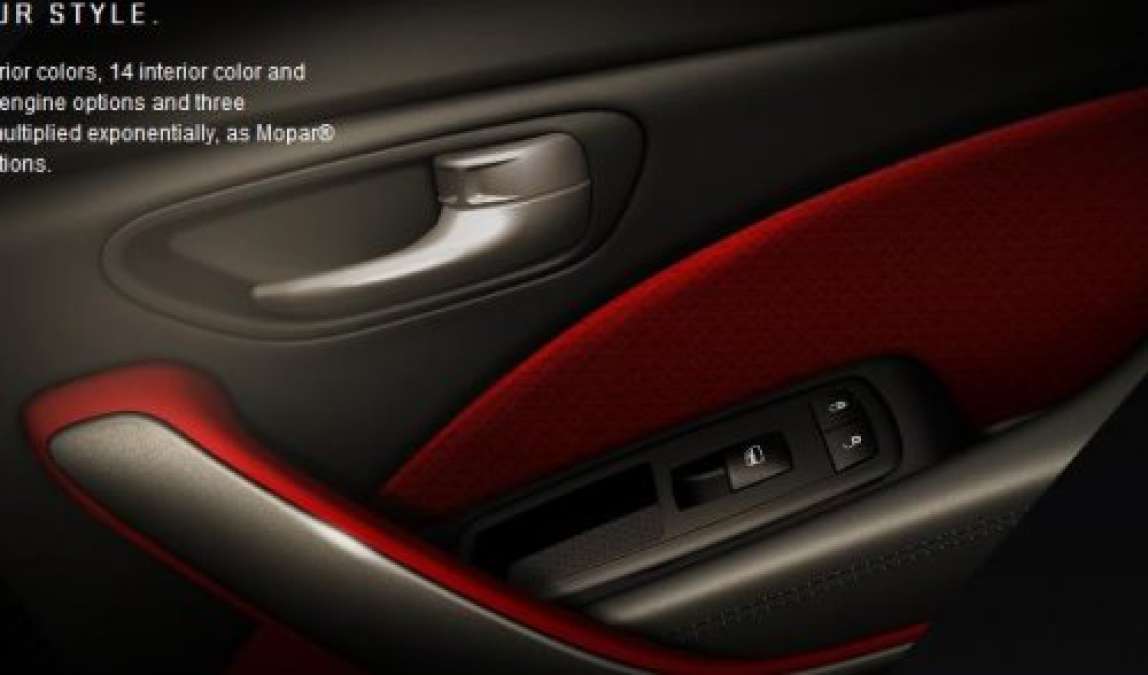 A teaser of the inner door panel of the 2013 Dodge Dart