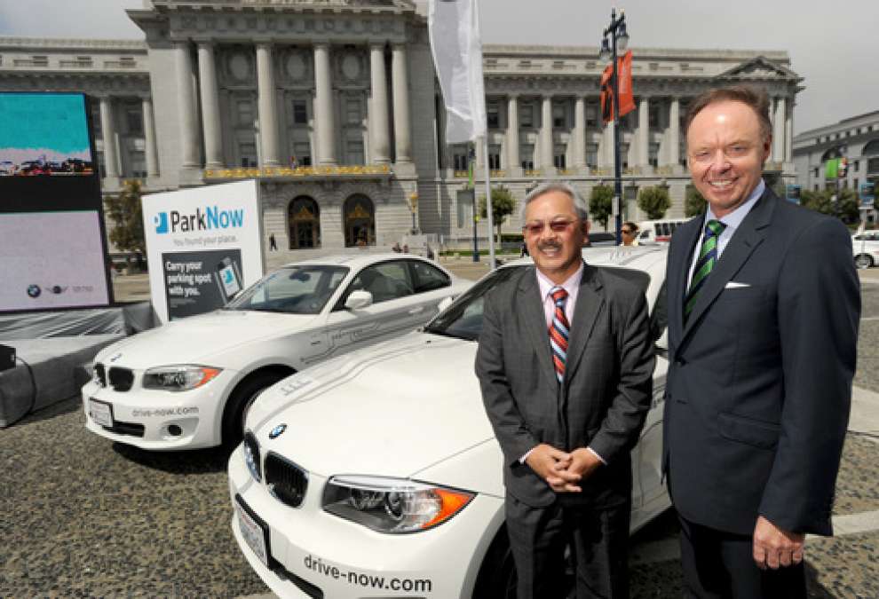 San Francisco Mayor Ed Lee and BMW Group board member Dr. Ian Robertson at a new
