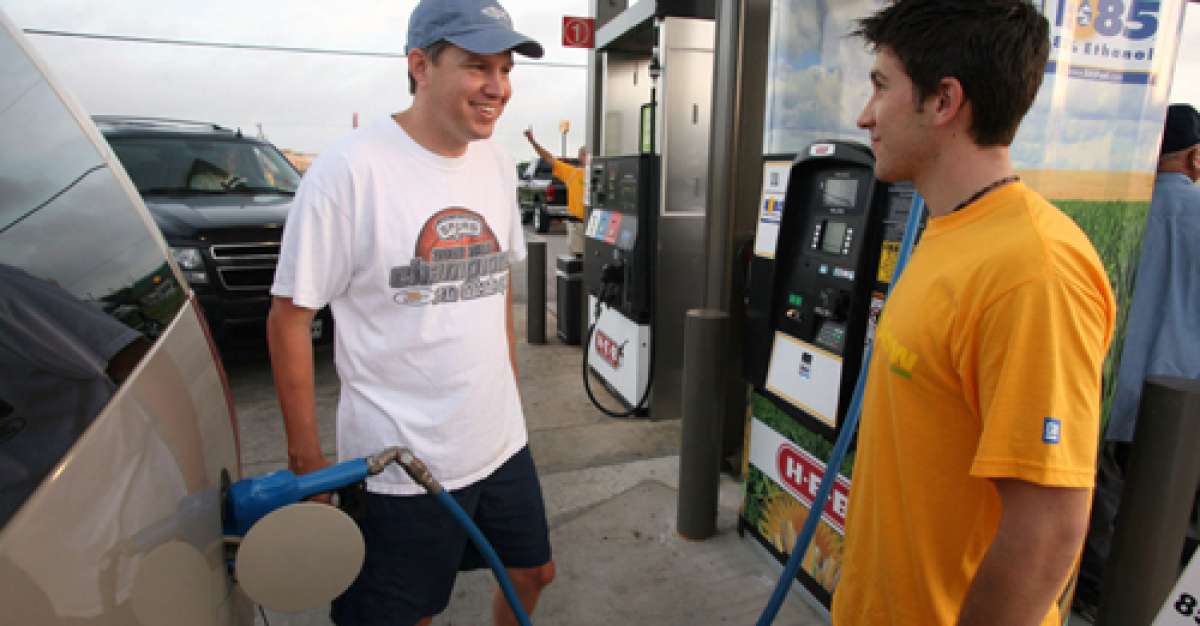 filling up gas at a gas station