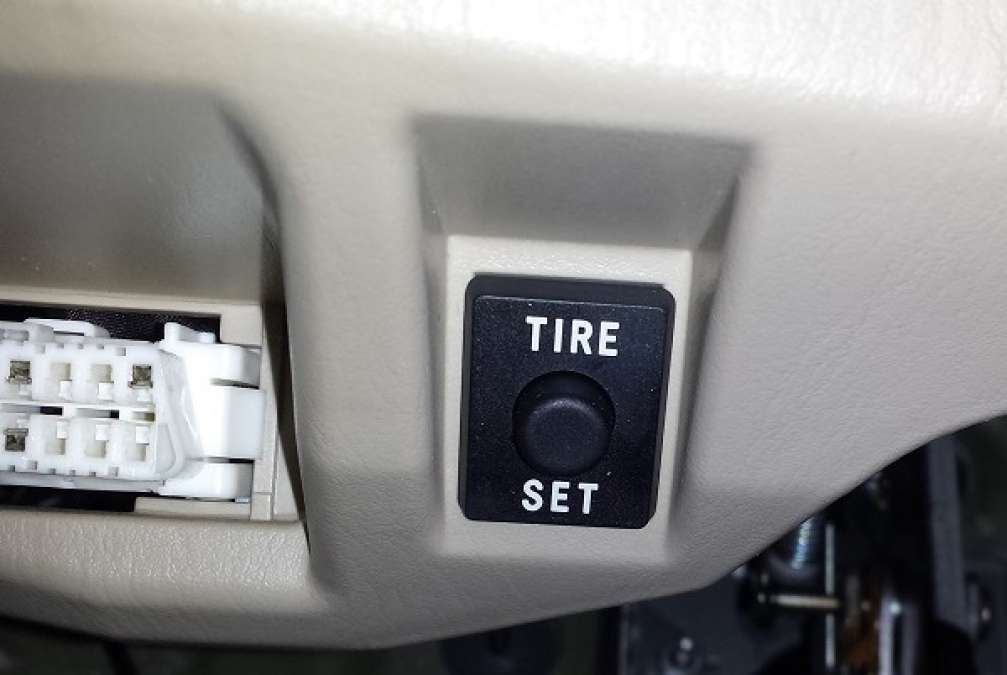Toyota's tire pressure monitoring system button and how to use it.