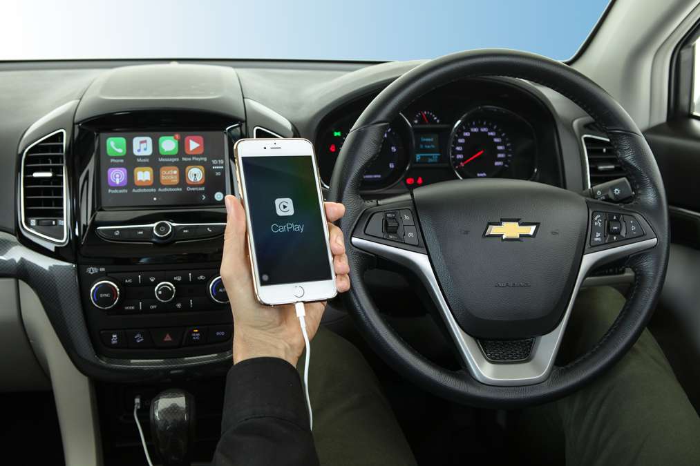 An Apple User Shows The CarPlay Interface In A Chevrolet