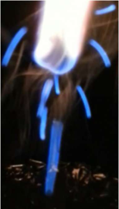 An image of the HydroBlaze candle burning. 