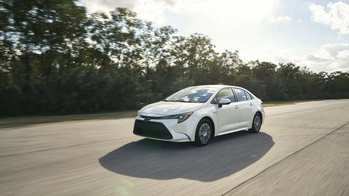 2020 Toyota Corolla Hybrid White Driving 