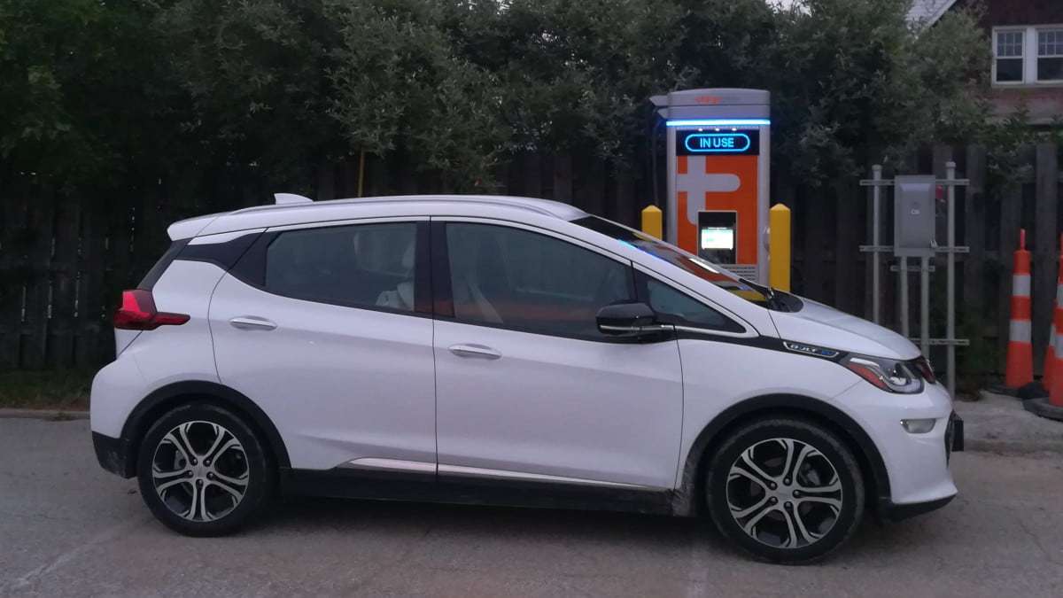 Chevy Bolt EV side view at charger