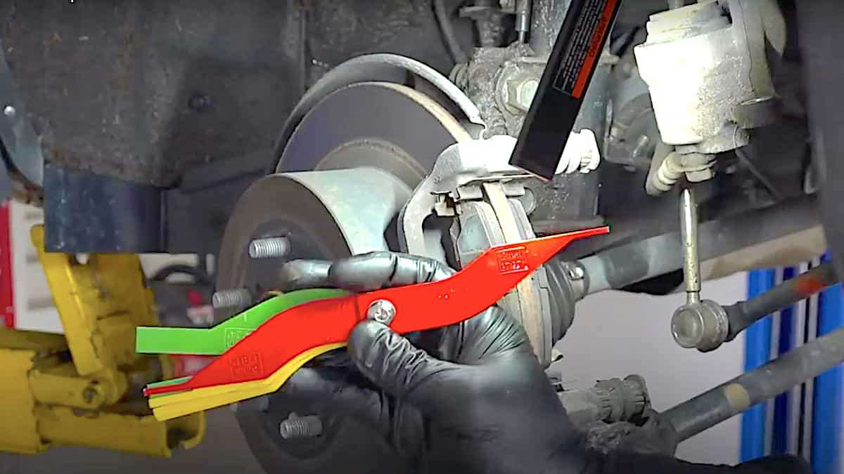 Checking brake pad wear is something many car owners can do.