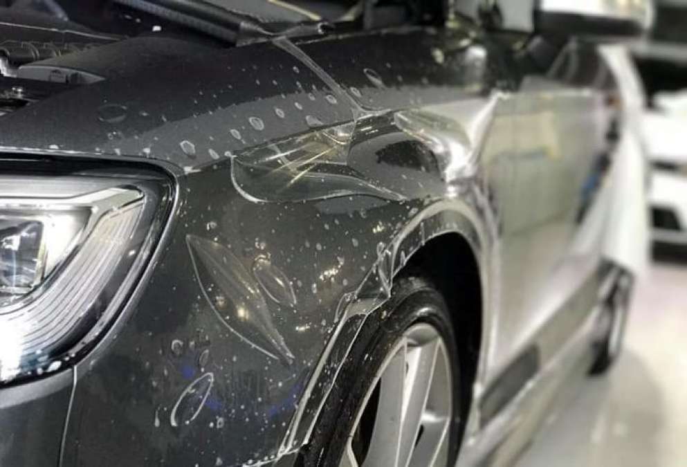 Car paint damaged by stone chips