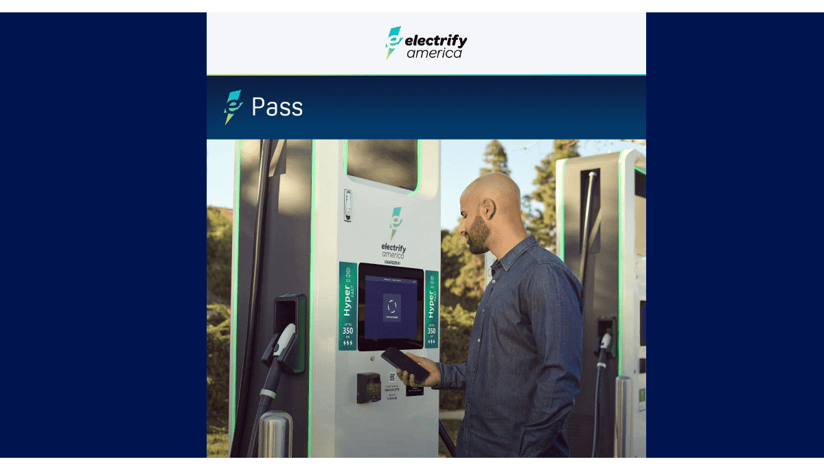 Image of EV charging customer paying courtesy of Electrify America.