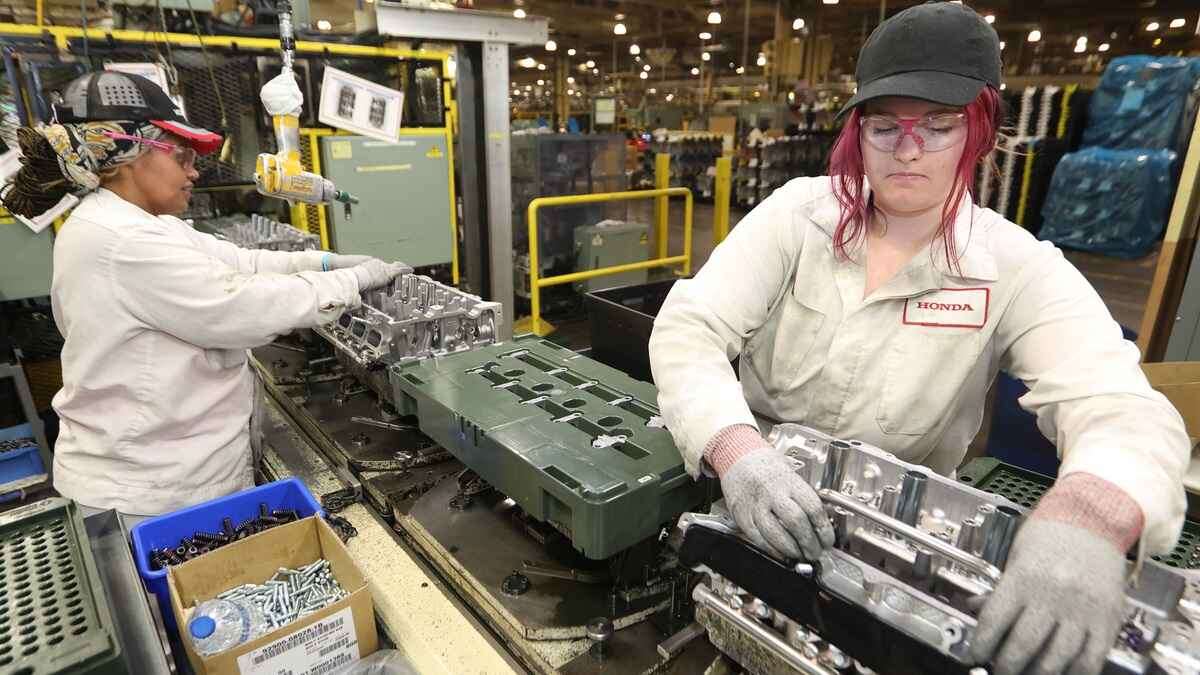 Female Honda employees assemble engines in Anna Ohio image courtesy of Honda.
