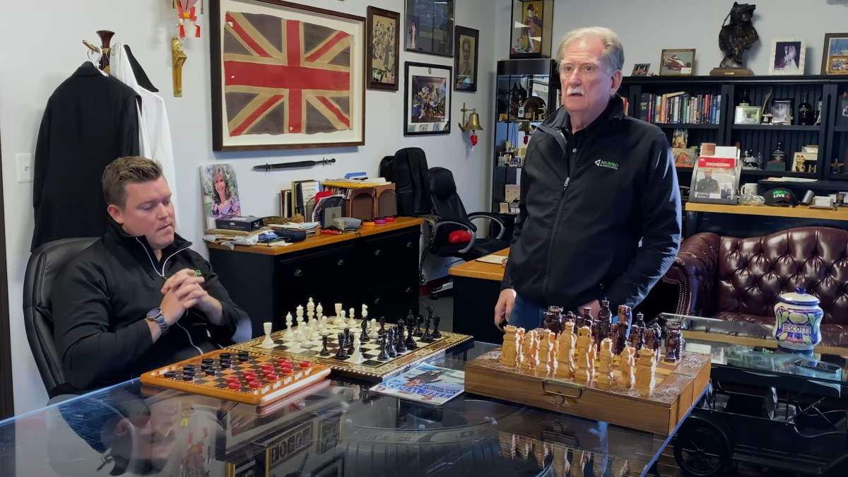 Legacy auto playing checkers; Tesla and Chinese playing chess