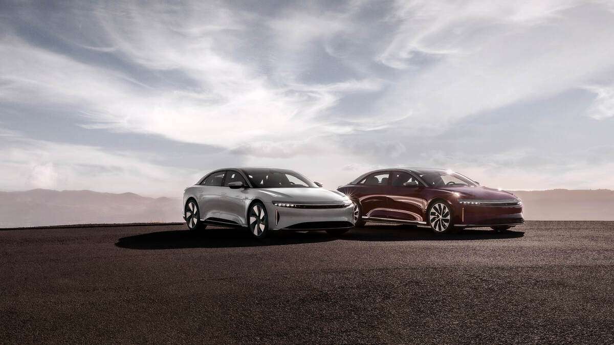 Image showing the Lucid Air Grand Touring and Grand Touring Performance parked beside each other.