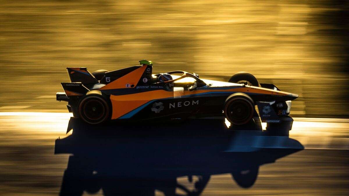 Side view of the McLaren Formula E car taken at sunset in Mexico City. The angular Gen 3 racers are the first to feature AWD.
