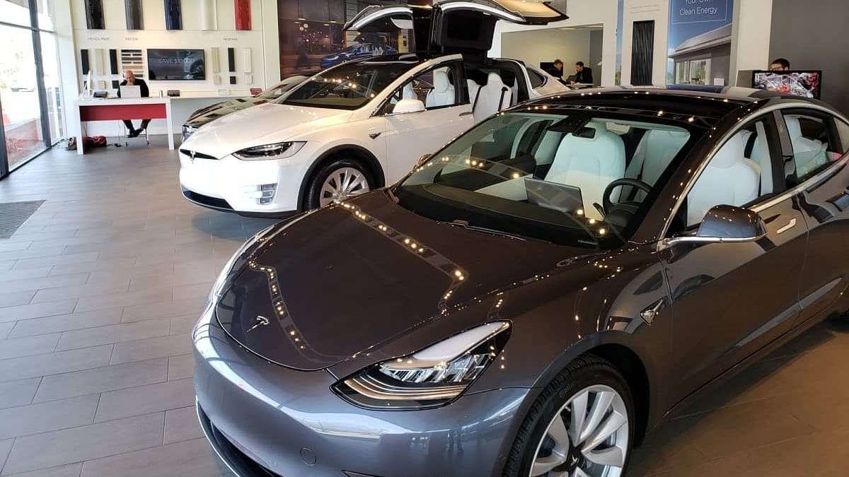 Image of Model 3 and Model Y inside of Massachusetts Tesla dealership by John Goreham