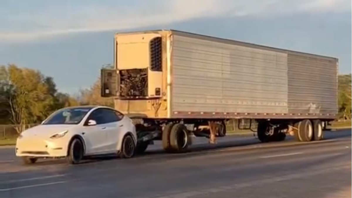 Tesla Model Y Seen Towing Semi Trailer: That's 3X Its Rated Towing Capacity