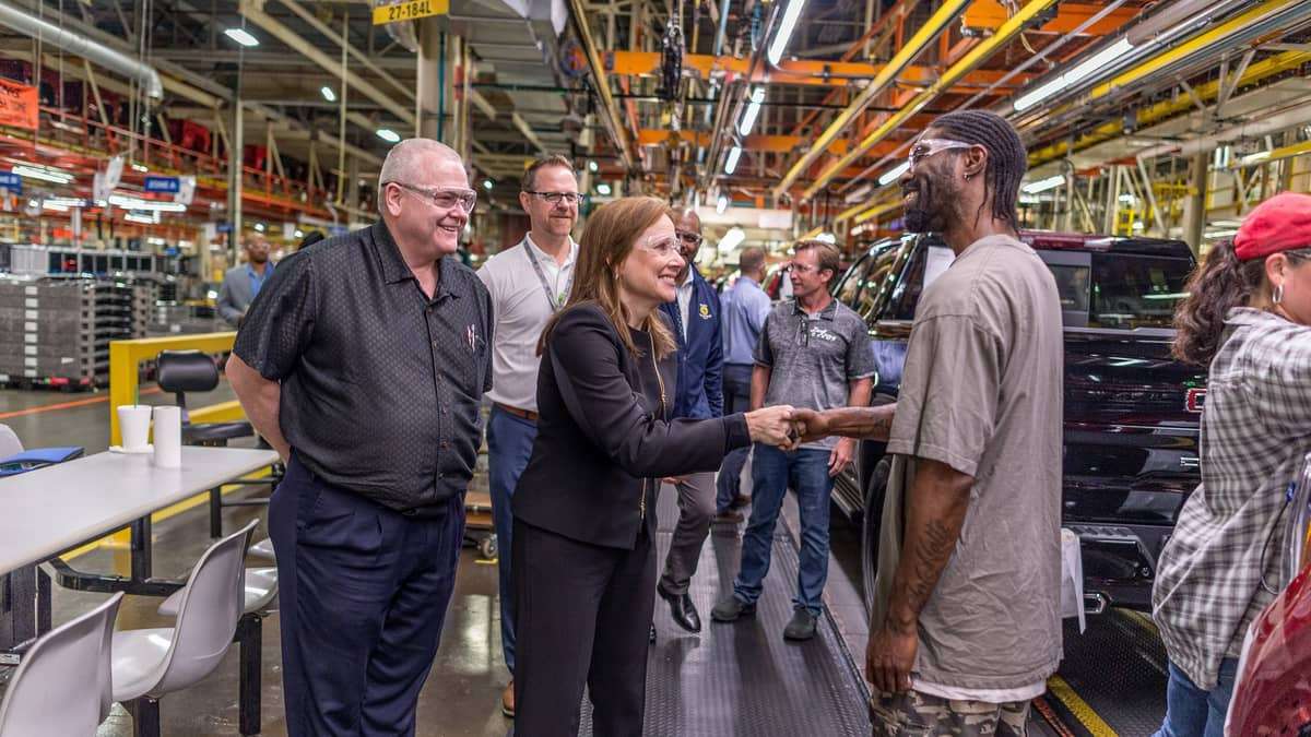 Mary Barra greets workers in GM truck plant