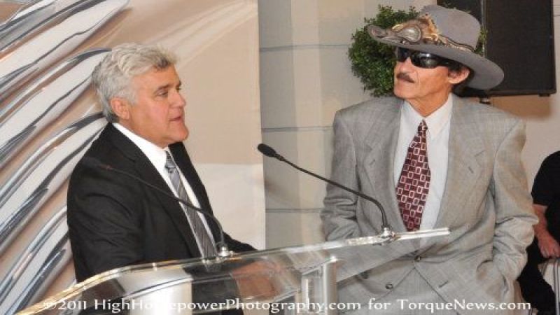 Jay Leno talks about the Volt while Richard Petty listens.