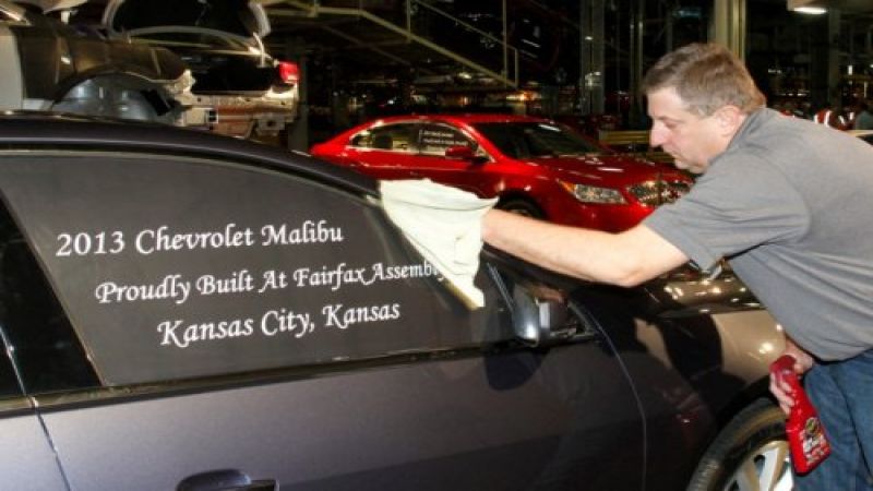 A 2013 Chevrolet Malibu coming off of the Fairfax line