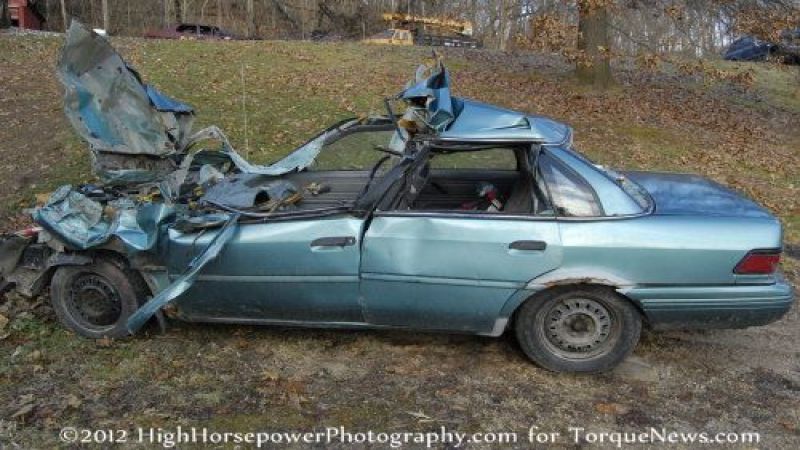 A wrecked Ford Tempo