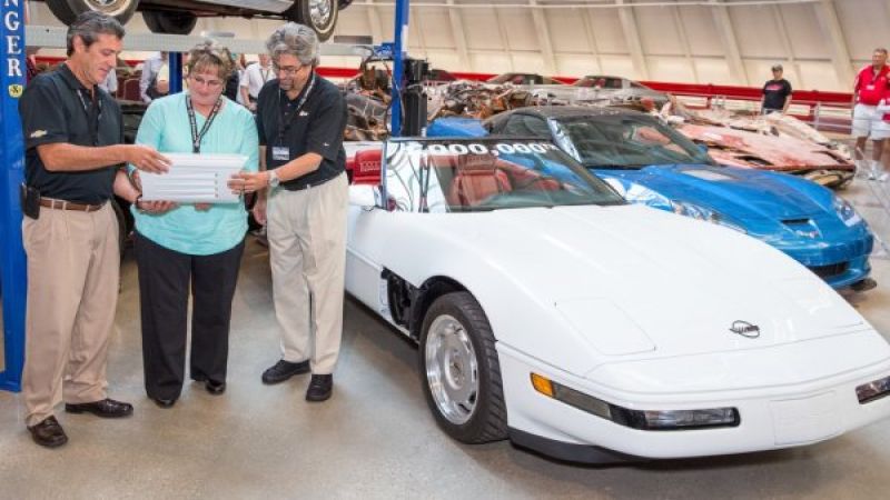 Angela Lamb signs the lower side panel