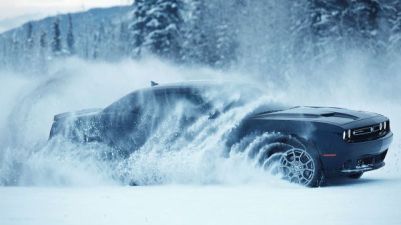 Challenger GT throwing snow
