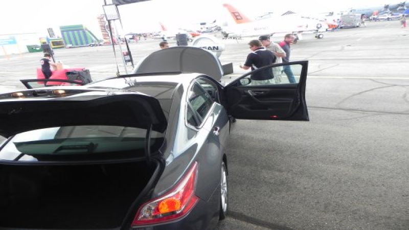 2013 Altima amidst the aircraft at the Rocky Mountain Air Show
