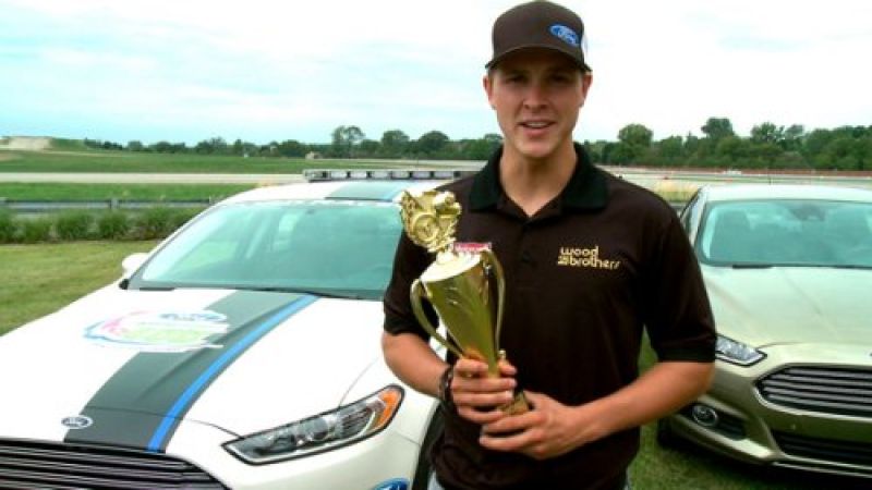 Ford NASCAR driver Trevor Bayne with EcoBoost MPG trophy