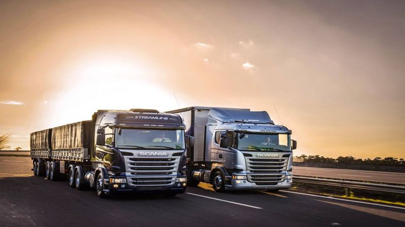Scania trucks on the road.