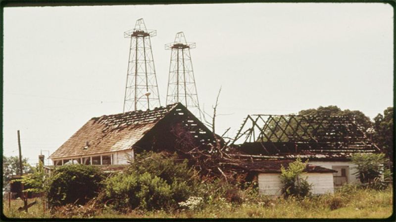 Abandoned oil wells on abandoned farm. National Archives and Records Administrat