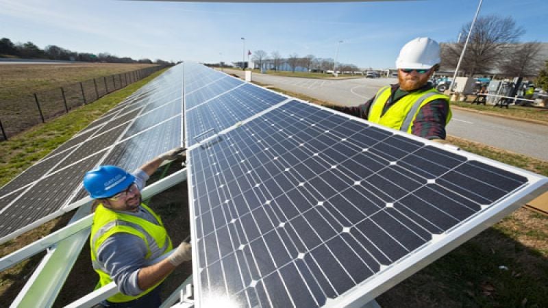 Solar panels are placed to complete BMW Manufacturing's new Solar array