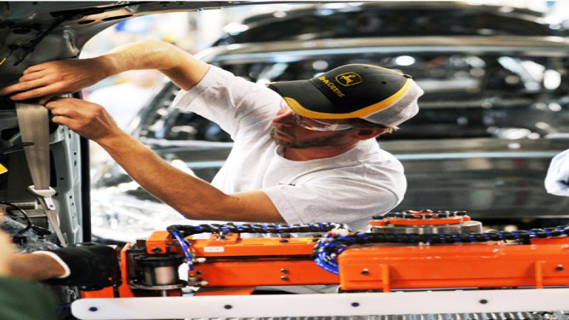 Ford employee John Bizek working on a C-MAX hybrid at MAP 