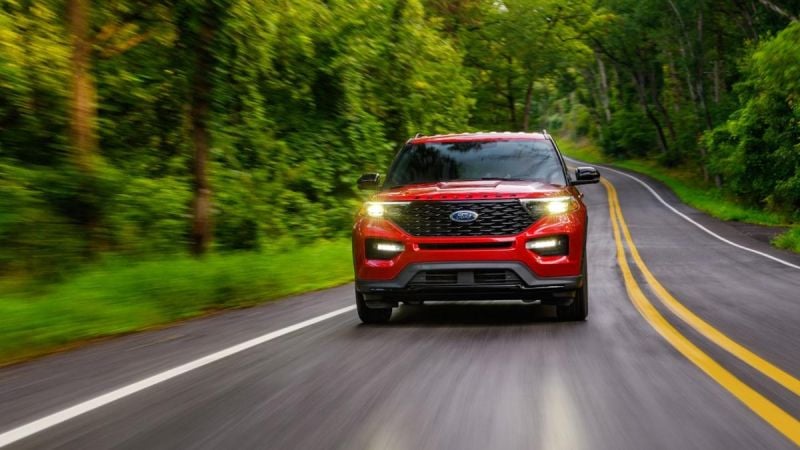  Ford Explorer cruising down road in daylight
