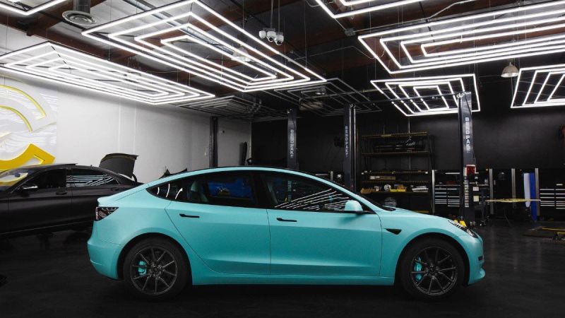 Stunning 2023 Tesla Model 3 with customer teal wrap