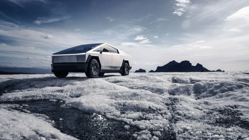 2025 Tesla Cybertruck Front 3-4 Quarters Silver Snow