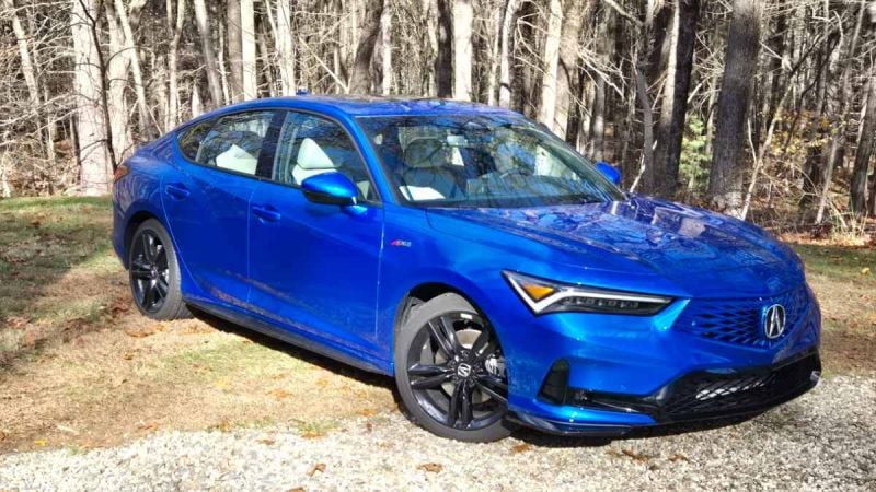 2026 Acura Integra A-Spec in blue features a stick-shift manual transmission