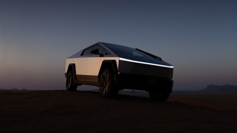 Tesla Cybertruck at sunrise on an off-road desert trail