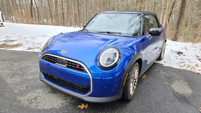 2025 MINI Cooper S Convertible looks out of place in a winter scene