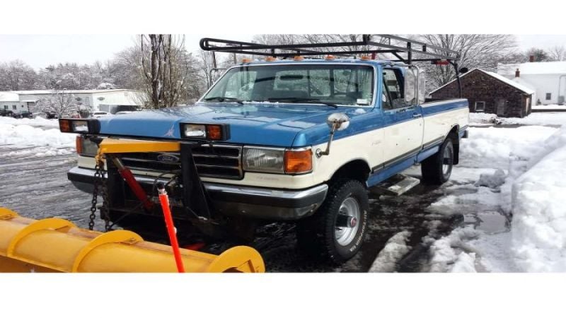 This Ford F-350 has plowed for more years than you will believe.  