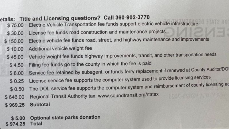 Vehicle registration fee breakdown showing electric vehicle, transportation, and licensing costs totaling $974.25