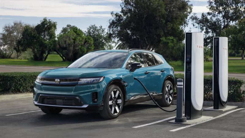 Honda Prologue EV at a Tesla Supercharger during road trip