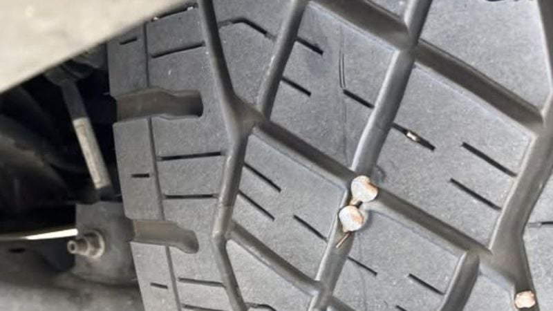 I Got Two Nails In My Cybertruck's Tire Side By Side And Whilte Discount Tire Can't Fix It Tesla Quoted Me $554, Which Seems High