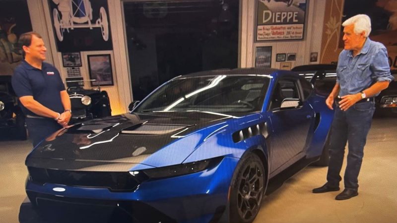 Jay Leno and Jim Farley with 2025 Mustang GTD