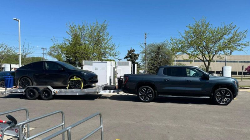 I Bought a GMC Sierra EV and Immediately Put It to the Test by Towing the Tesla Model Y I Drove to the Dealership, And I Was So Impressed I Hardly Even Noticed It Back There