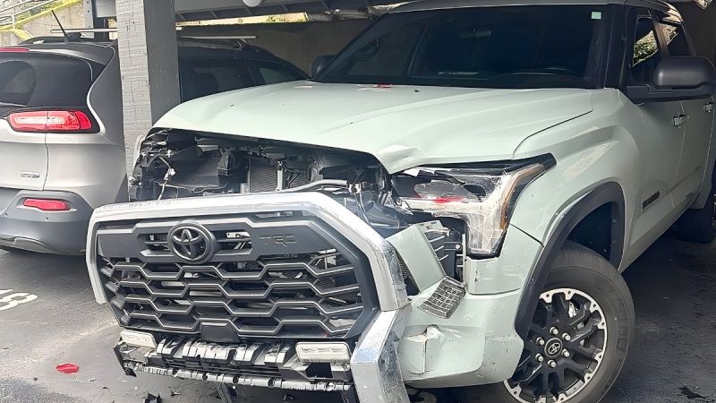 Jordan Taylor's 2025 Toyota Tundra after it was hit by another car and the grille completely damaged, and the insurance limit was only $25K.