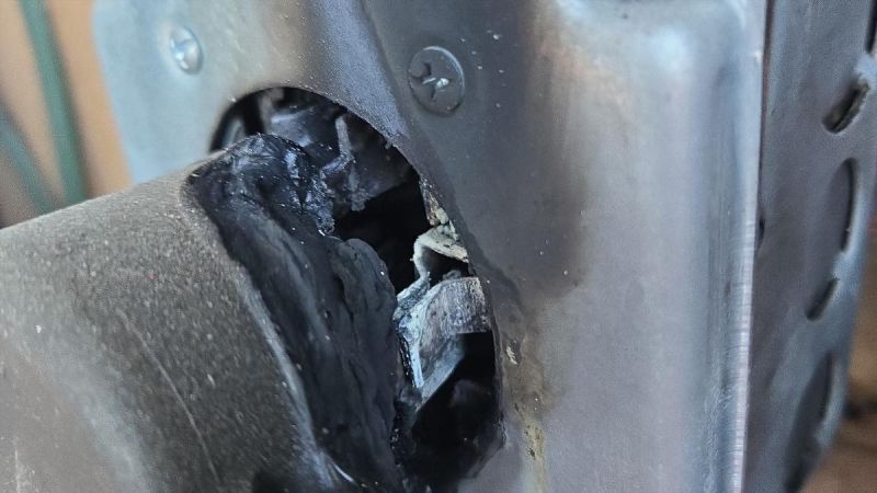 A mobile charger for a Chevy Bolt electric vehicle that has melted and burned is shown