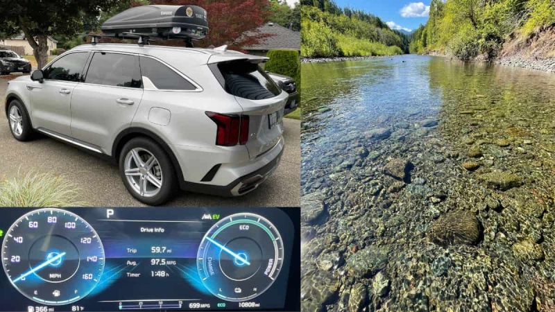 Silver Kia Sorento PHEV, dashboard display showing MPG and a river